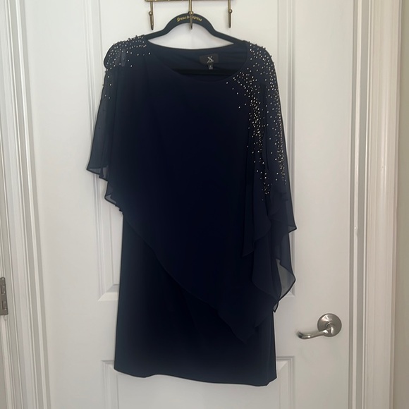 Navy Blue float size 12 dress. Super stretchy and flowy - Picture 1 of 4